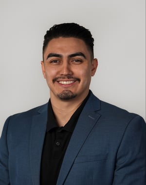 9 Standing Headshot 2-1-1